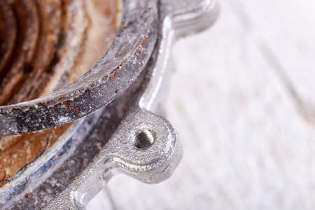 Dirty seal caused by limescale. Repair of kitchen appliances in the workshop. Light background.