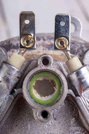 Electric heater connector for the coffee machine. Accessories and spare parts for kitchen appliances. Light background.の写真素材