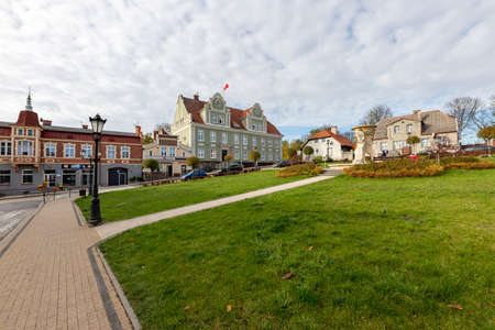 Skarszewy, pomorskie / Poland - November, 4, 2020: Market square and old tenement houses in a small town in Pomerania. The center of a small town. Autumn season.のeditorial素材