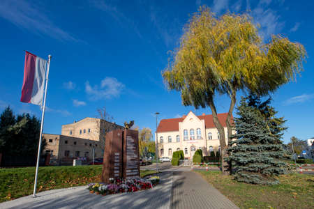 Trzcianka, wielkopolskie / Poland - November, 20, 2020: A square and a monument in the city center. Center of a small city in Central Europe. Autumn season.のeditorial素材