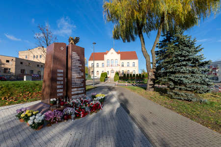 Trzcianka, wielkopolskie / Poland - November, 20, 2020: A square and a monument in the city center. Center of a small city in Central Europe. Autumn season.のeditorial素材