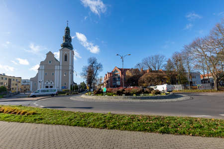 Trzcianka, wielkopolskie / Poland - November, 20, 2020: The church and the main intersection in the city. Center of a small city in Central Europe. Autumn season.のeditorial素材