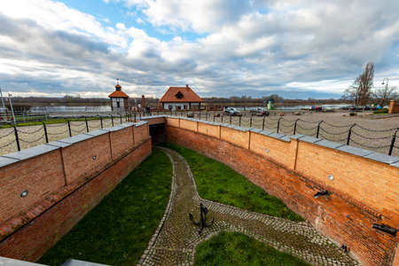 Grudziadz, Kuyavian-Pomeranian Voivodeship Poland - November, 27, 2020: Old tenement houses and historic buildings. A city on a large river in Central Europe. Autumn season.のeditorial素材