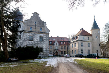 Tuczno, West Pomeranian Voivodeship Poland - February, 23, 2021: Old brick castle in a small town in Pomerania. A stronghold located in Central Europe. Spring season.のeditorial素材