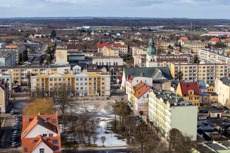 Czluchow, Pomeranian Voivodeship Poland - February, 26, 2021: Buildings of a small town - view from the tower. Residential houses in the center of a small town in Central Europe. Spring season.のeditorial素材