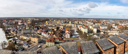 Czluchow, Pomeranian Voivodeship Poland - February, 26, 2021: Buildings of a small town - view from the tower. Residential houses in the center of a small town in Central Europe. Spring season.のeditorial素材