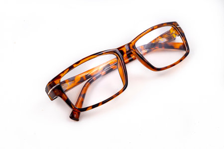 Glasses for people with visual impairments. Magnifying glasses for reading. Light background.の写真素材