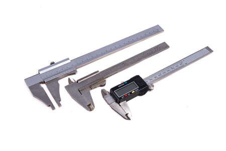 Measuring tools used for workshop measurements. Metal accessories for checking the gaps in the locksmith's workshop. Light background.の写真素材