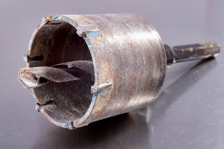 Hole drill with widia blades. Accessories for builders working in the construction of single-family...