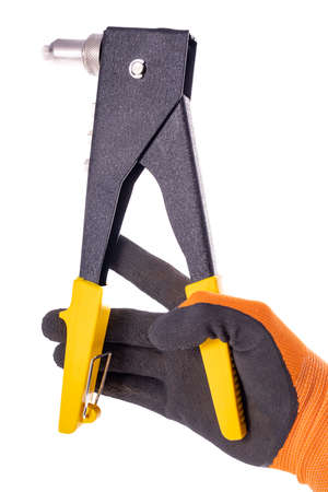 Hand riveter for assembly work. Accessories for mechanics used in mechanical work. Light background.の写真素材