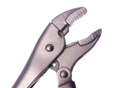 Adjustable clamp wrench used in installation work. Accessories for plumbers. Light background.の写真素材