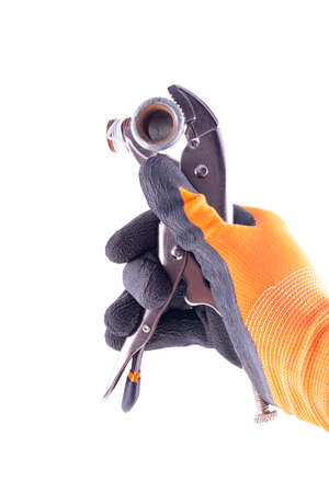 Hand held clamp wrench with a hydraulic coupling. Accessories for mechanics to carry out repairs in the household. Light background.の写真素材