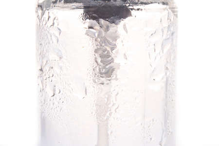 Water drops against the sides of the container. Water on the water storage container. Light background.の写真素材