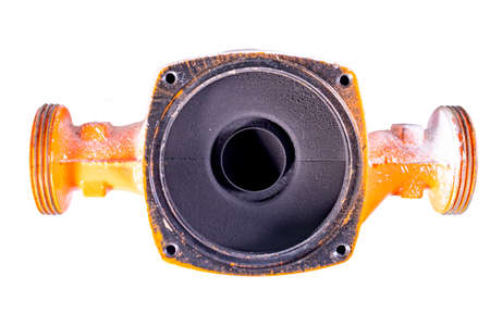 The inside of an old water pump. Water pump blades and hoses contaminated with limescale. Isolated background.の写真素材