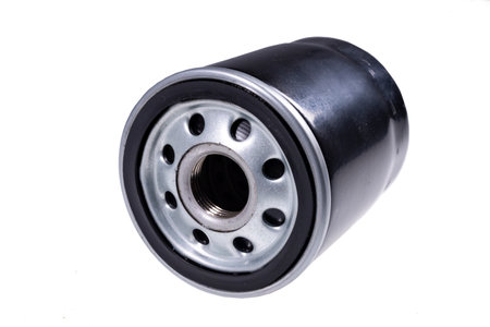 Oil filter used in passenger cars. Parts and accessories for sewing cars with an internal combustion engine. Isolated background.の写真素材