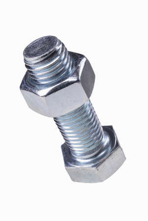 Metal bolt with nut. Accessories for assembling metal parts in a mechanical workshop. Licked background.の写真素材