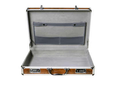 Open aluminum case for storing documents. Personal accessories for transporting office supplies. Isolated background.の写真素材