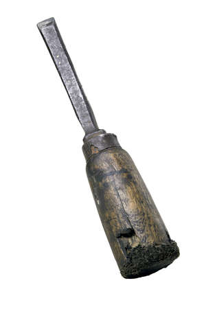 Old soiled carpentry chisel. Old woodworking accessories. Isolated background.の写真素材
