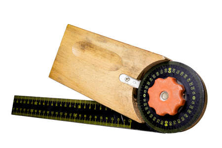 Carpentry square for measuring angles in a carpentry workshop. Accessories for carpenters to build wooden furniture. Isolated background.の写真素材