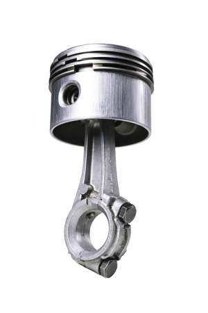 Piston and connecting rod of a small internal combustion engine. Spare parts for engine repair and regeneration. Isolated background.の写真素材