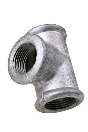 Metal hydraulic tee for connecting pipes. Accessories used to repair plumbing. Isolated background.の写真素材