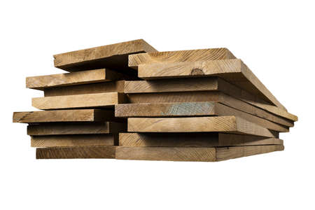 A pile of dark-tinted ash planks. Stacked planed boards. Isolated background.の写真素材