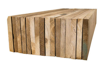 A pile of ash planks tinted dark in color. Stacked planed boards. Isolated background.の写真素材