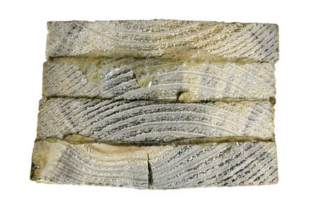 Four pieces of wood glued with resin-based glue. Raw wood planks glued together. Isolated background.の写真素材