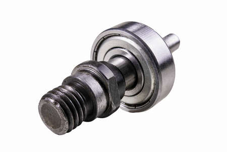 Ball bearing and metal axle. Spare parts for production machines. Isolated background.の写真素材