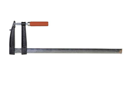 Carpenter's clamp used in a carpentry shop. Metal joinery accessories. Light background.の写真素材