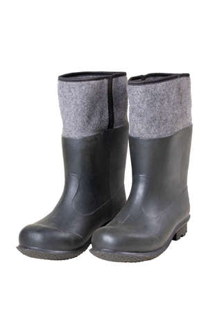 Rubber boots for production workers. Work clothes which workers working in the field are equipped with. Isolated background.の写真素材