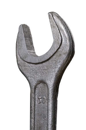 Metal open-end wrench for loosening screws in the workshop. Tools for work in a mechanical workshop....