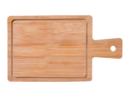 Bamboo bread board in the kitchen. Kitchen accessories for use in the household. Isolated background.の写真素材