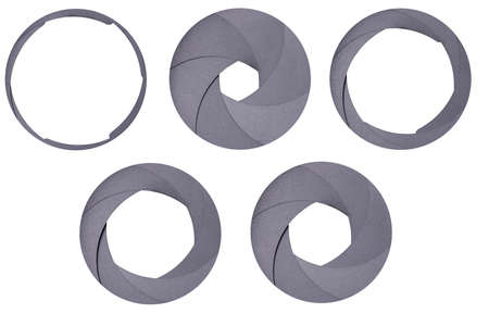 Aperture blades used in a camera lens. Different value of the aperture opening in the optical system. Isolated background.の写真素材