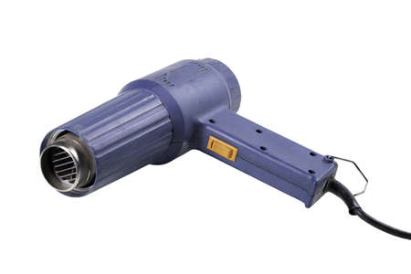 Manual heat gun used in the workshop. Accessories for surface heating. Isolated background.の写真素材