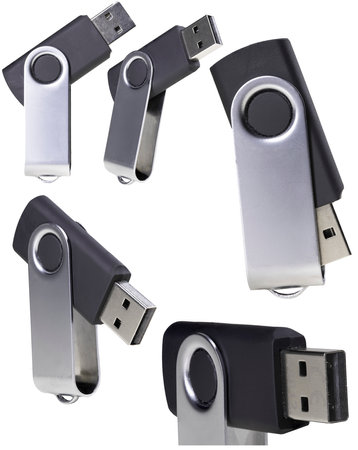 USB flash drive with a metal handle. Computer data storage device. Isolated background.の写真素材