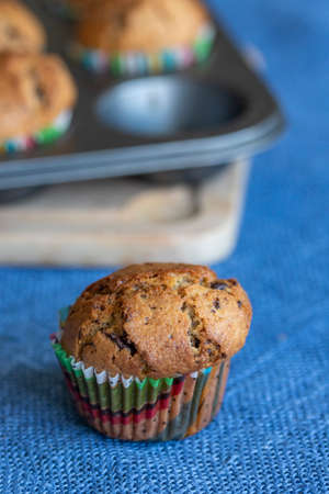 Tasty cupcake in a paper mold. Dessert prepared in home cooking.の写真素材