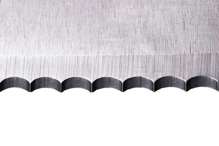 The blade of the bread knife at high magnification. Accessories used in the home kitchen. Isolated background.の写真素材