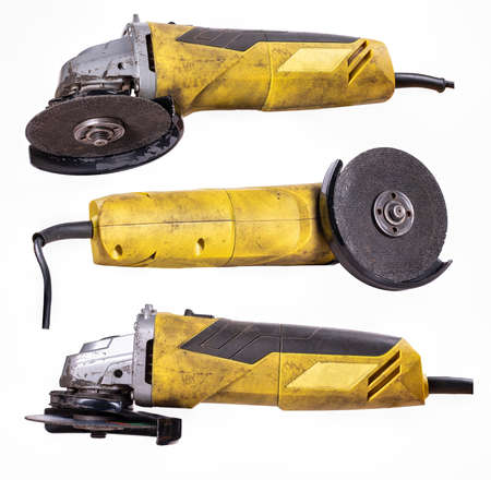 Angle grinder for cutting metal with an abrasive disc.の写真素材