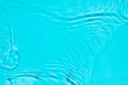 Aqua waves on green background. Light and shadows.. Natural sunlight and shade. Summer mood Minimal...