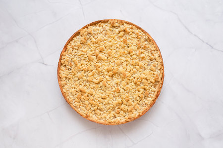 Freshly baked apple pie on a white background. Homemade pastries made from dough and apples. Backdrop with foodの写真素材