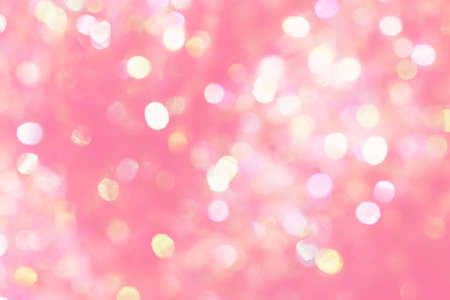 Beautiful natural bokeh of the colorful lights. Abstract Christmas New Year backdrop for text or advertising. Template for banner or party invitationの写真素材