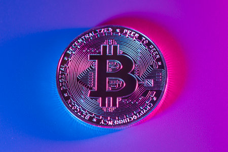 Bitcoin electronic virtual cryptocurrency for online banking. Business currency technology concept. Close up macro view. Stock market. Beautiful purple and pink colorの写真素材