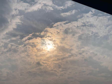 The sun shines through the clouds. The sun shines through the clouds.の写真素材