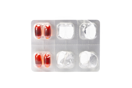The unpack red translucent medicine on white background isolatedの写真素材