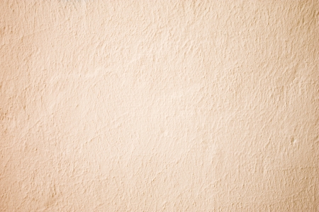 Peach Paint on Rough Wallの写真素材