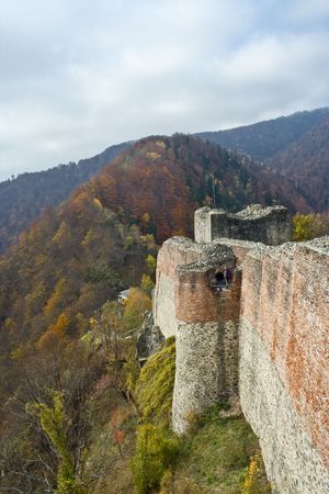 Ruins of Dracula's fortress on the top of a mountain in Poenari, Romaniaの写真素材