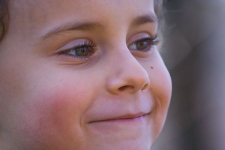 Close up portrait of a smiling childの写真素材
