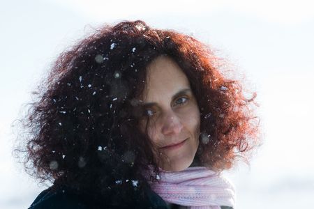 Portrait of a beautiful woman outdoor in a winter day