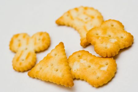 Pile of delicious biscuits isolated over white background